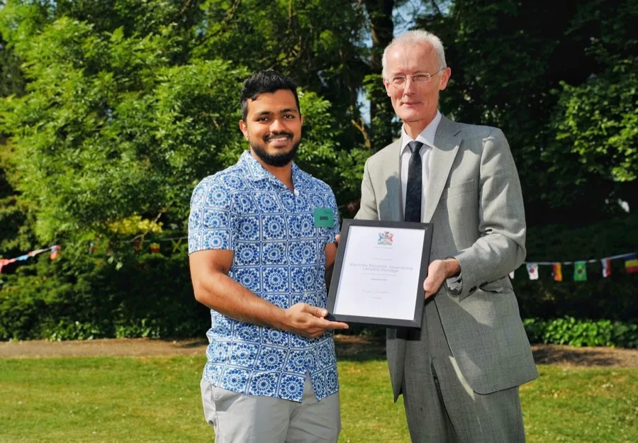 Randula Jayarathna receiving a community impact award in Cheltenham, Gloucestershire | TechQilo